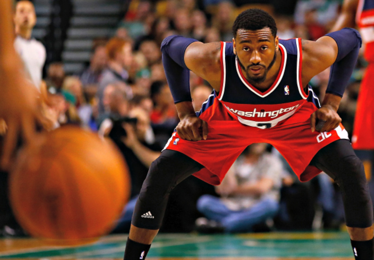 John Wall and the Wizards have come to hang their hat on defense. (Jared Wickerham/Getty Images)